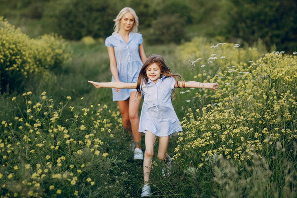 mom and daughter outside