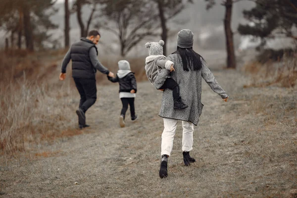 Cute family playing in a spring forest — Stock Photo, Image