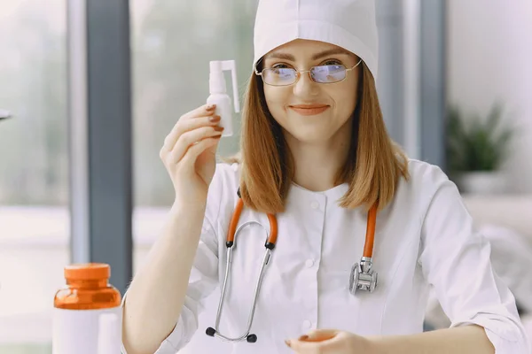 Woman doctor with white coat in hospital — Stock Photo, Image