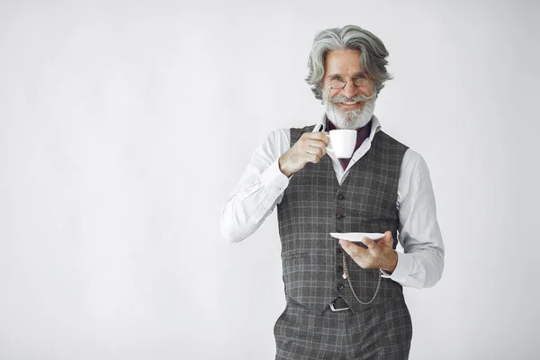 Handsome pensive mature businessman in formal suit — Stock Photo, Image