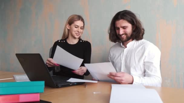 Man and woman collegues working with papers at office — Stock Video