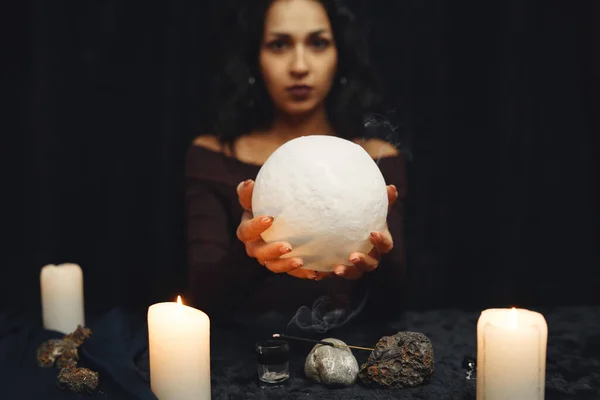 Portrait of fortune-teller in a dark room — Stock Photo, Image