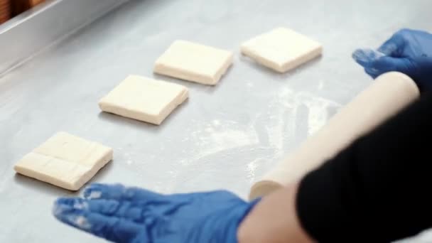 Rolling the pastry dough on a flat surface — Stock Video
