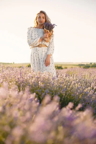Woman in a white dress in a lavender field — Stock Photo, Image