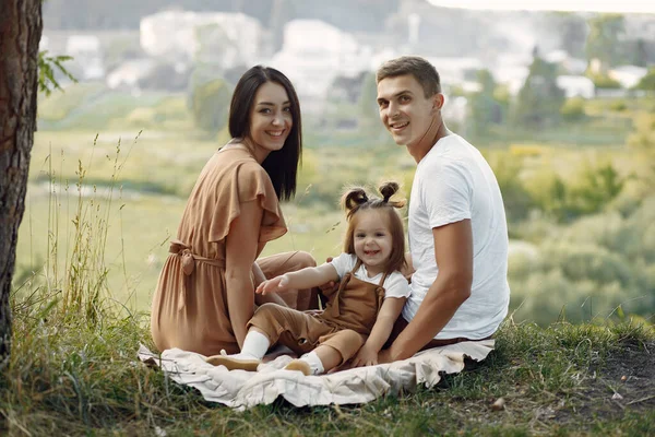 Cute family playing in a autumn field — Stock Photo, Image