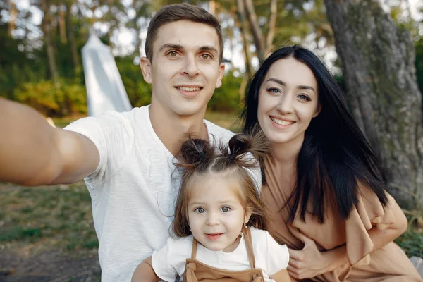 Cute family playing in a autumn field — Stock Photo, Image