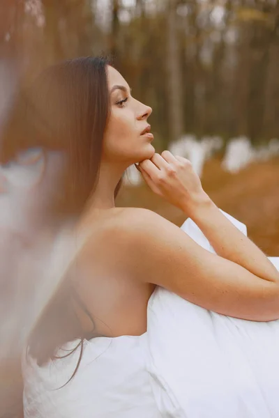 Picture of beautiful woman in white bathrobe — Stock Photo, Image