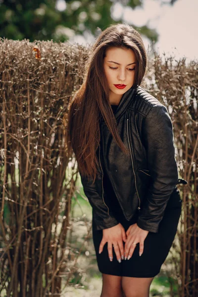 Beautiful brunette poses for photos — Stock Photo, Image