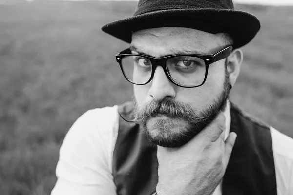 Beard man in field lonley — Stock Photo, Image