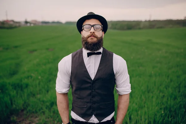 Beard man in field lonley — Stock Photo, Image