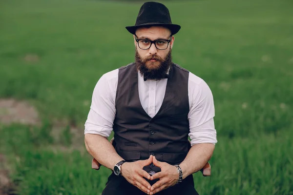 Beard man in field lonley — Stock Photo, Image