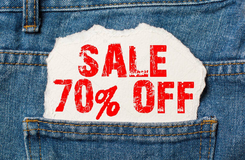 Sale 70 off on white paper in the pocket of blue denim jeans