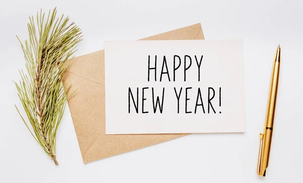 Happy New Year Note Envelope Spruce Branch Gold Pen White — стоковое фото