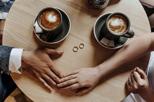 Man Woman Couple Newlyweds Hold Hands Rings Cafe Cup Coffee — Stock Photo, Image