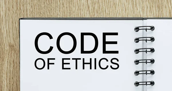 Notepad Text Code Ethics Wooden Deskt Business Finance Concept — Stock Photo, Image