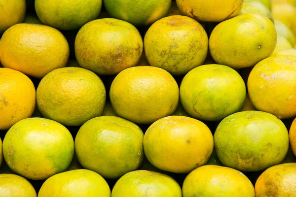 Fruta de laranja no mercado para fundo — Fotografia de Stock