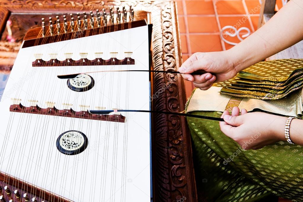 Hand play dulcimer, music instrument,Thai wooden dulcimer musica