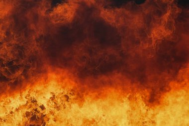 Yangın doku izole siyah arka plan üzerine alevler. Mükemmel doku bindirmeleri için kopya alanı