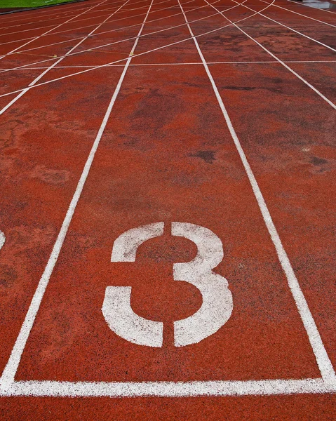 Pista de atletismo número 3 . — Foto de Stock