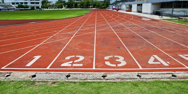 Lane atletická dráha číslo 1-4. — Stock fotografie