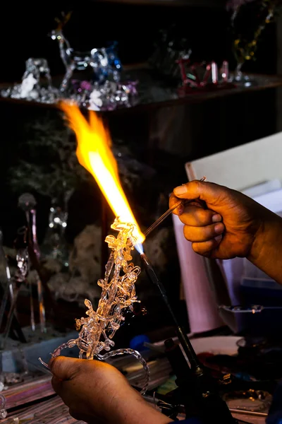 Melting glass into a vine. — Stock Photo, Image