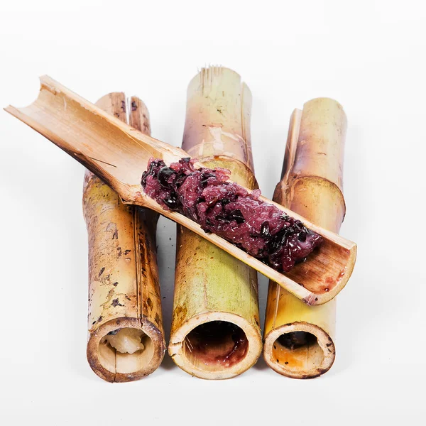 Glutinous rice roasted in bamboo joints on a white background. — Stock Photo, Image