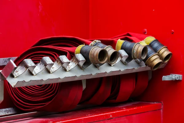 Rolled up firehoses — Stock Photo, Image