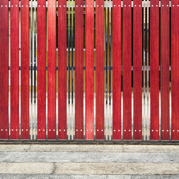 Red painted wooden fence panels. — Stock Photo, Image