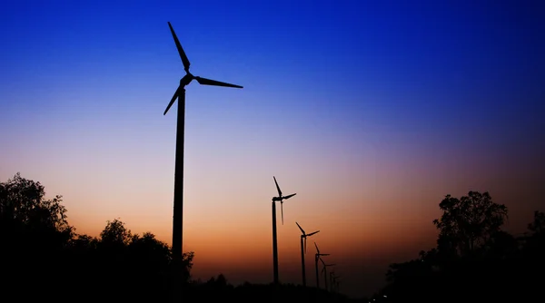Wind turbine sunset background ecosystem for design — Stock Photo, Image