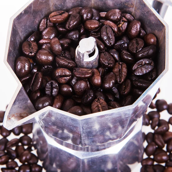 Coffee beans and coffee pot — Stock Photo, Image