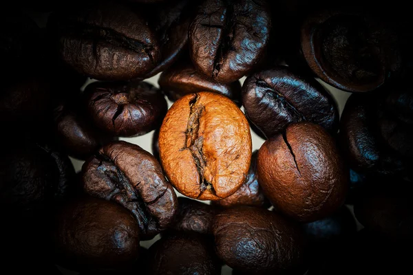 Heap of coffee beans on the table — Stock Photo, Image