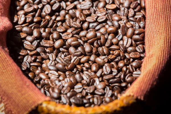 Coffee beans in a sack — Stock Photo, Image