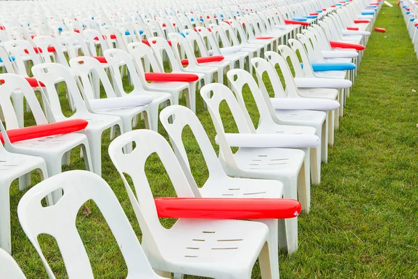 White plastic chairs in celebration and outdoor event
