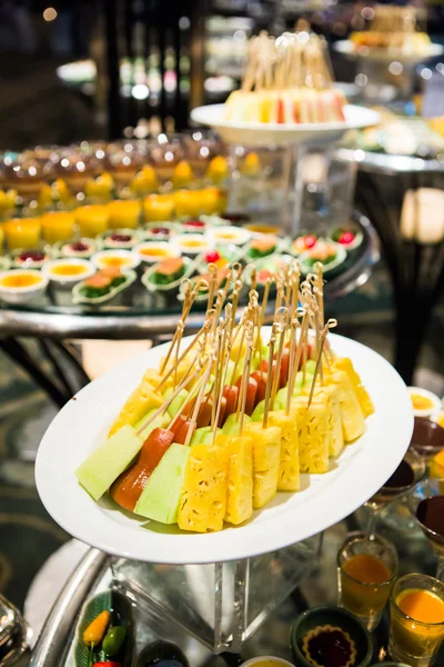 Cocktail party with variety of desserts and food decorated in sp