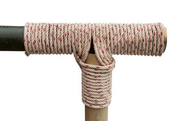 Rope tied knot at bamboo wood on a white background. — Stock Photo, Image