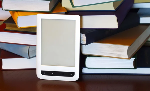 Laptop and a stack of books — Stock Photo, Image