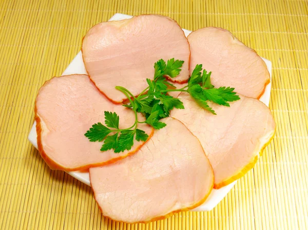 Carbonate and parsley on a plate — Stock Photo, Image