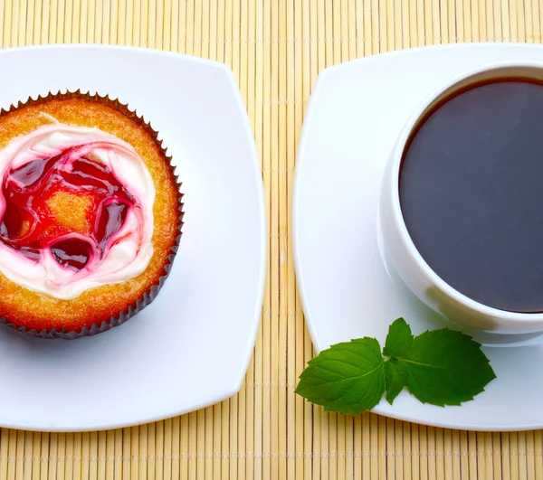 Cup of coffee and cake-basket with mint — Stock Photo, Image