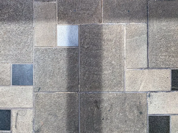 Gri kareli ve dikdörtgen blok zemin dokusu modern bir şablon ile birleştirilmiş..