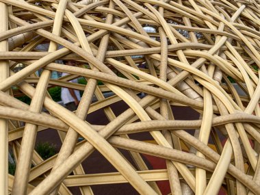 Doğal kahverengi dokuma ahşap malzemesinden yaratılan soyut doku ve desen.