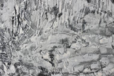 Duvardaki gri ve beyaz çimento alçı dokusu pürüzlü, süpürülmüş bir desen, genellikle tamamlanmamış inşaatlarda ya da tamamlanmamış bir stilde bulunur..