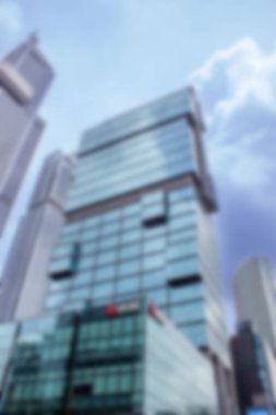 Soyut arkaplan odak dışı. Jakarta, Endonezya - 21 Aralık 2025: Thamrin Nine 'daki UOB Plaza binası, Cakarta' nın merkez ticaret bölgesinde modern istiflenmiş mimarisi olan lüks bir ofis binasıdır..