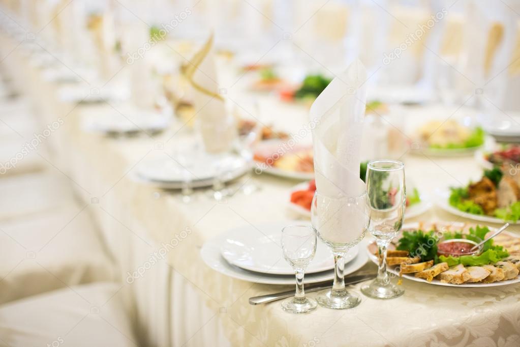 Banquet table setting glass on evening reception