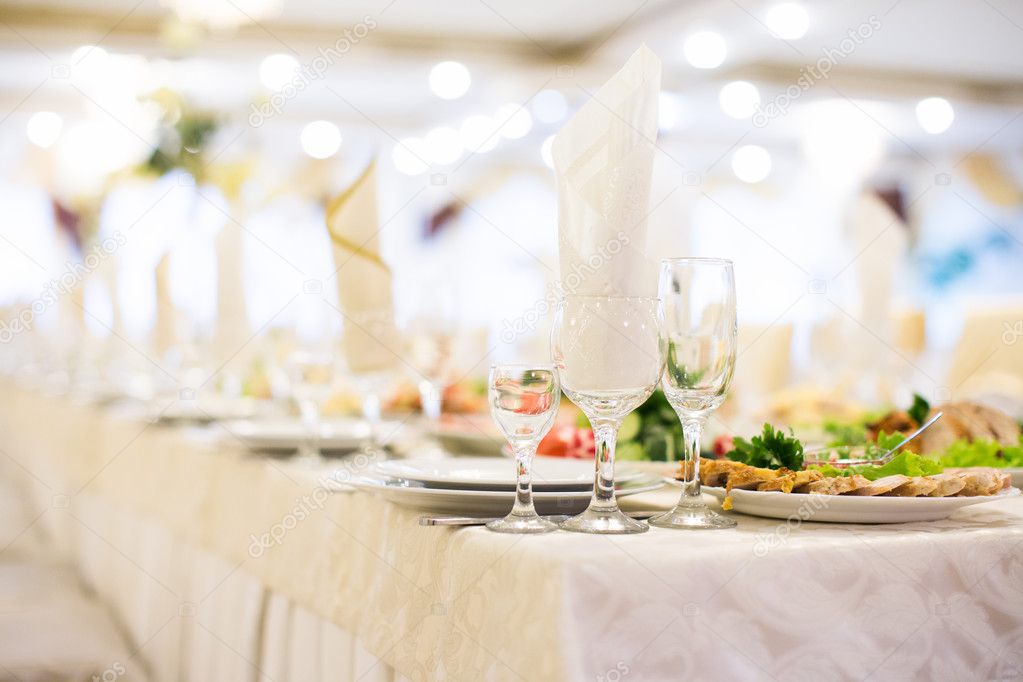 Banquet table setting glass on evening reception