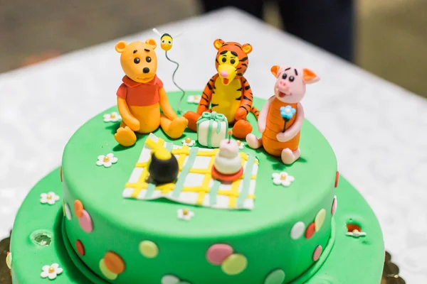 Birthday cake with candles and Winnie the Pooh by Disney — Stock Photo, Image