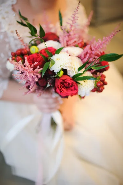 Bride holding a bouquet — Stock Photo, Image