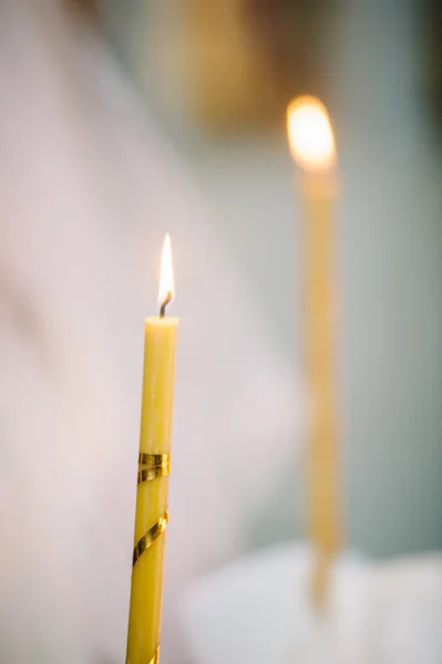 Burning thin candle during christening — Stock Photo, Image