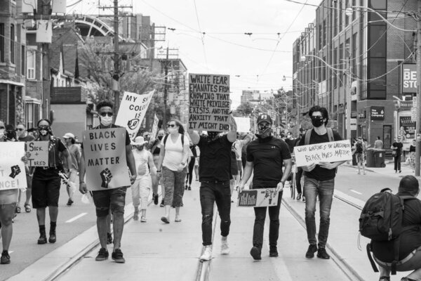 TORONTO, ONTARIO, CANADA - JUNE 6, 2020: Anti-Racism March, in solidarity with Black Lives Matter and against the death of George Floyd and police injustice.