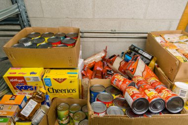 TORONTO, ONTARIO, CANADA - NOVEMBER 25, 2020: BOXES OF FOOD AT JEWISH FOOD BANK, FOOD FOR FAMILIES IN NEED OF HELP DURING COVID-19 PANDEMIC. clipart