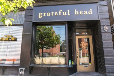 TORONTO, CANADA - AUGUST 21, 2017: ROW OF STORES ON EAST SIDE RONCESVALLES AVENUE clipart